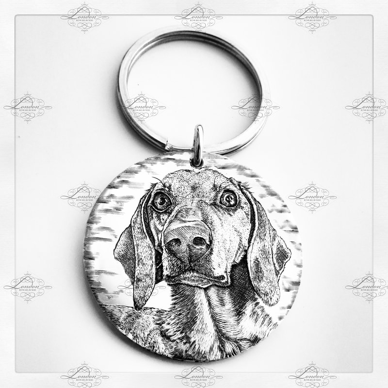 Dachshund pet portrait on a sterling silver handmade keyring 32mm wide. Sausage dog, doxie