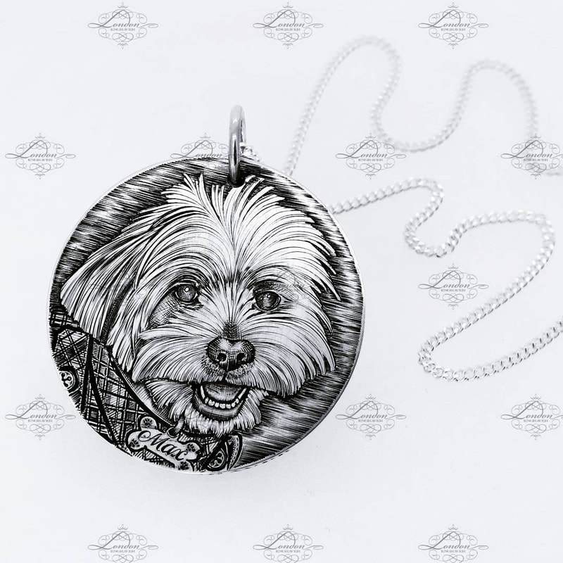 Hand engraved pet portrait on a handmade sterling silver pendant 32mm wide, with silver necklace.