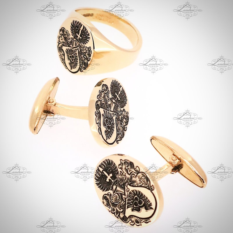 Matching yellow gold signet ring and T-Bar cufflinks, all hand engraved with a Coat of Arms, with black enamel