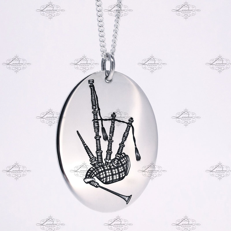 Bagpipes on a handmade sterling silver pendant with necklace