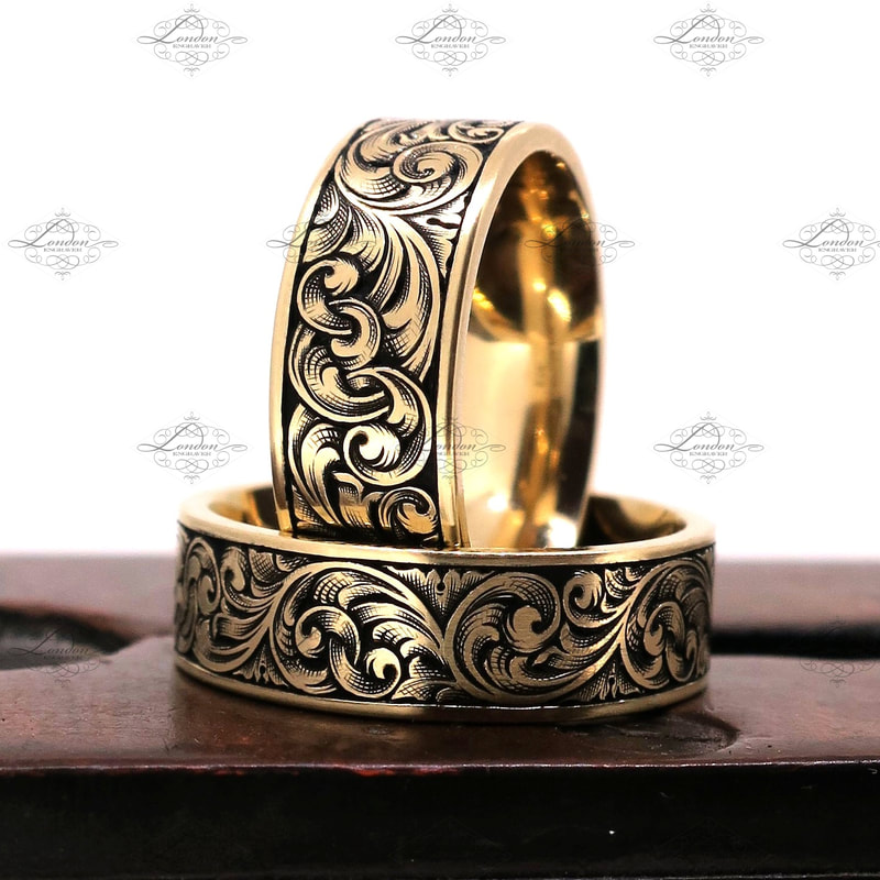 Yellow gold wedding rings with matching hand engraved scrollwork