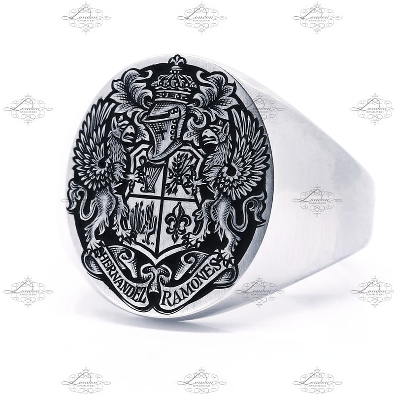 Oxford Oval platinum signet ring with a background removed Coat of Arms, with black enamel